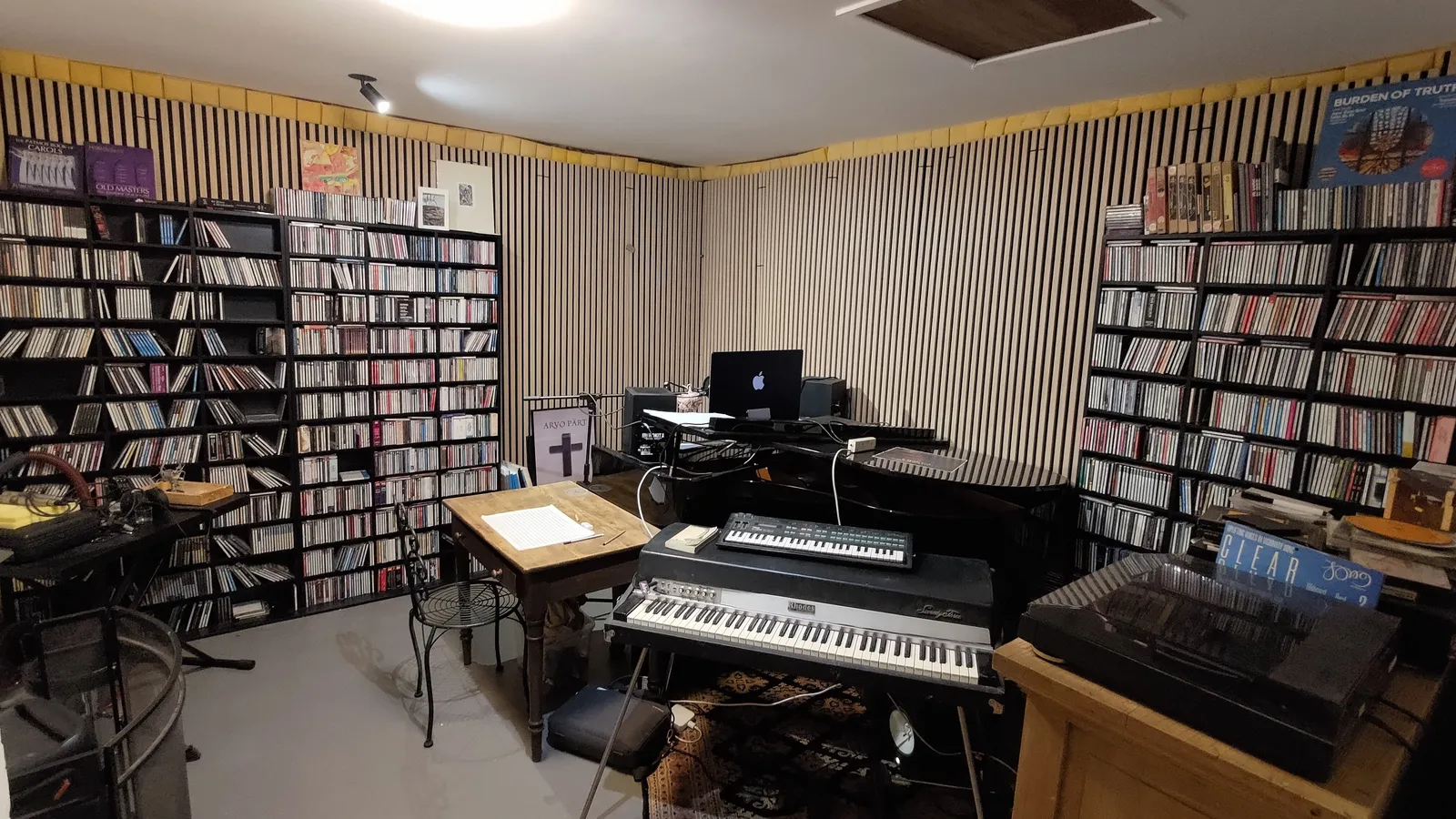 Studio Saskia: keyboards, the workstation, and a floor-to-ceiling CD library